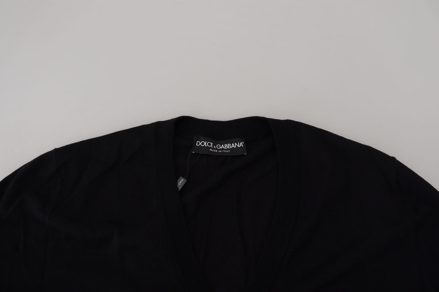 Dolce & Gabbana Schwarze Strickjacke aus Wolle mit Knopfleiste