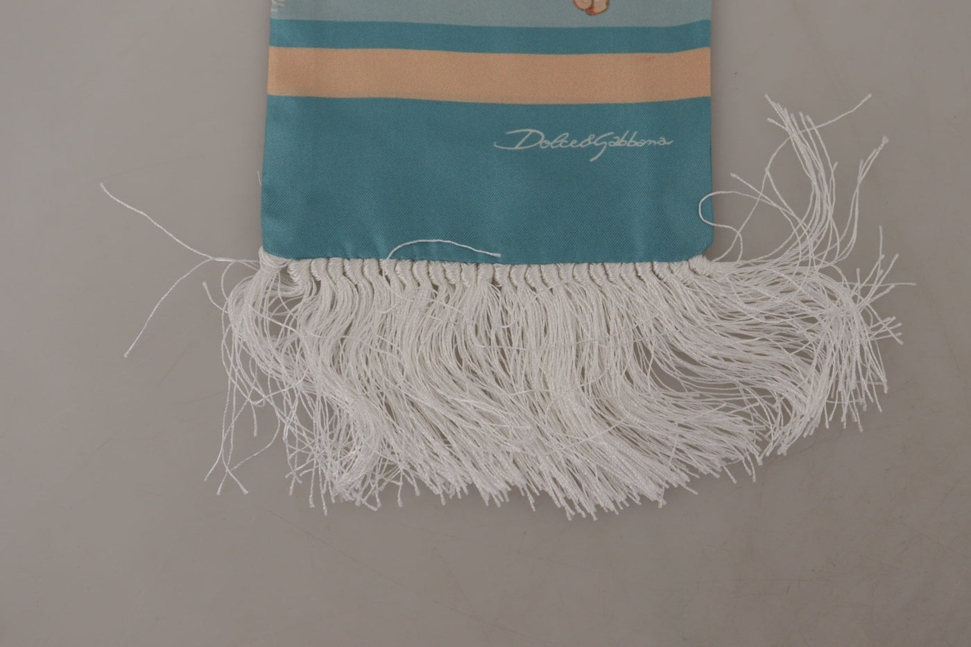 Dolce & Gabbana Blauer Seidenschimmernder Muscheldruck Halswickelschal mit Fransen