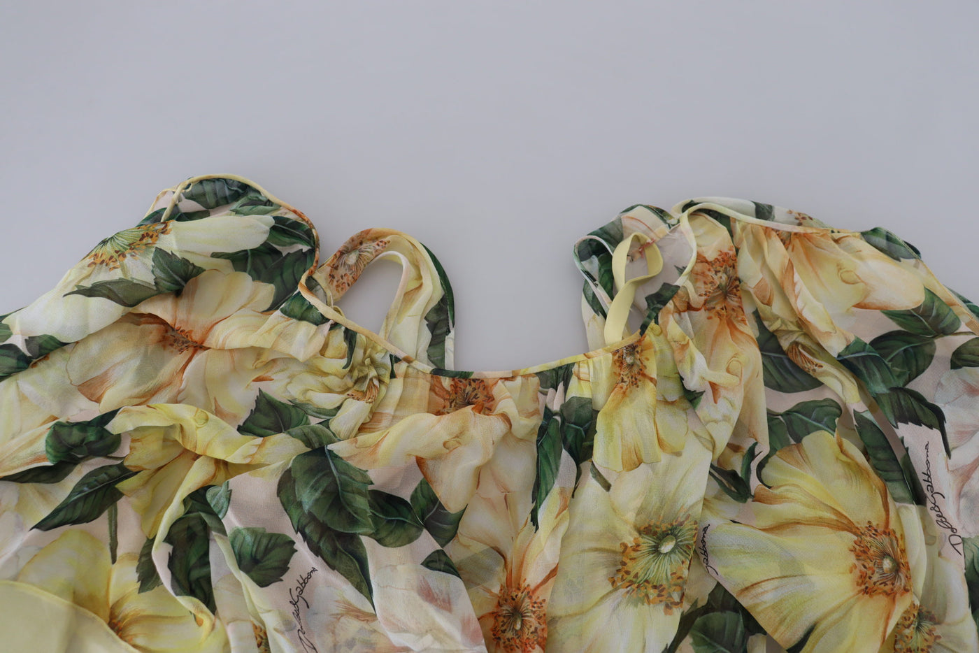 Dolce & Gabbana Gelbes Maxikleid mit Blumendruck und Plissee aus Seide
