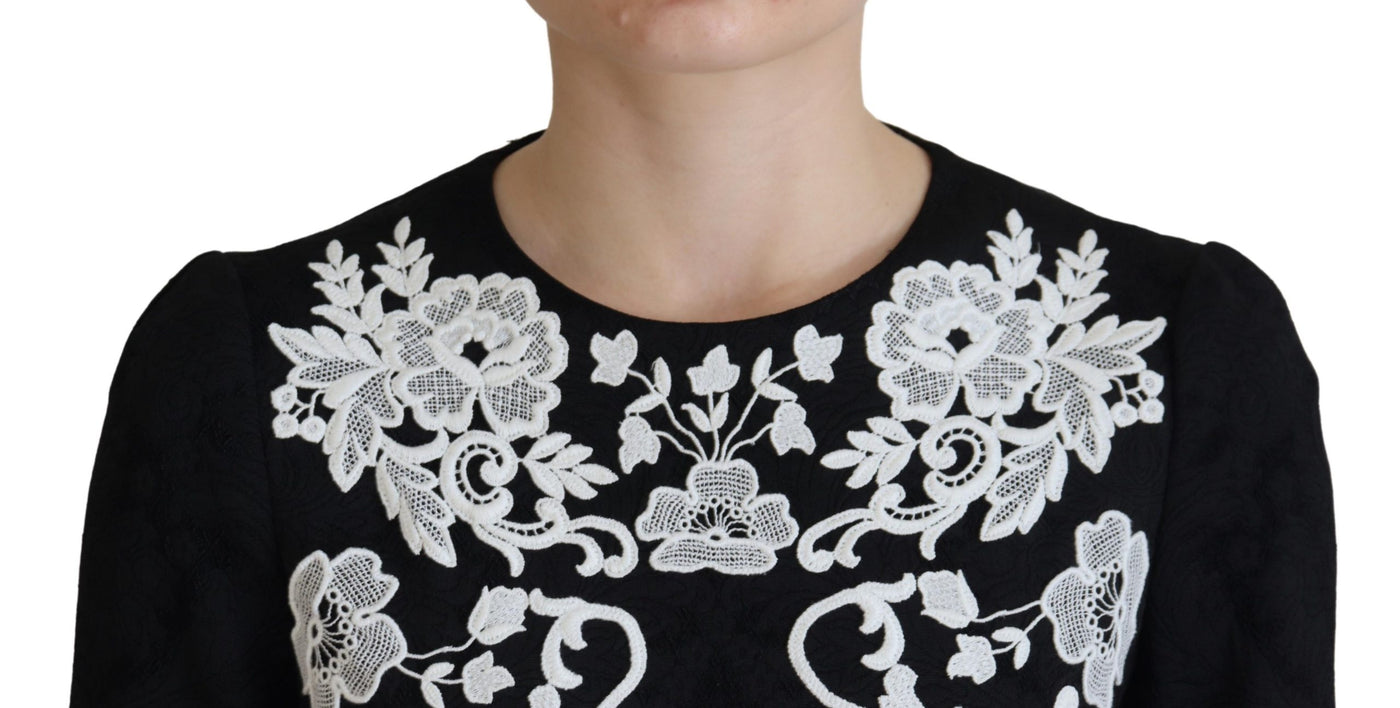 Dolce & Gabbana Schwarzes Kleid mit Spitzenbesatz und halben Ärmeln in A-Linie
