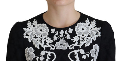 Dolce & Gabbana Schwarzes Kleid mit Spitzenbesatz und halben Ärmeln in A-Linie