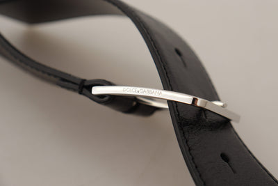 Dolce & Gabbana Schwarzer Kalbsledergürtel mit eingraviertem Logo und Metallschnalle