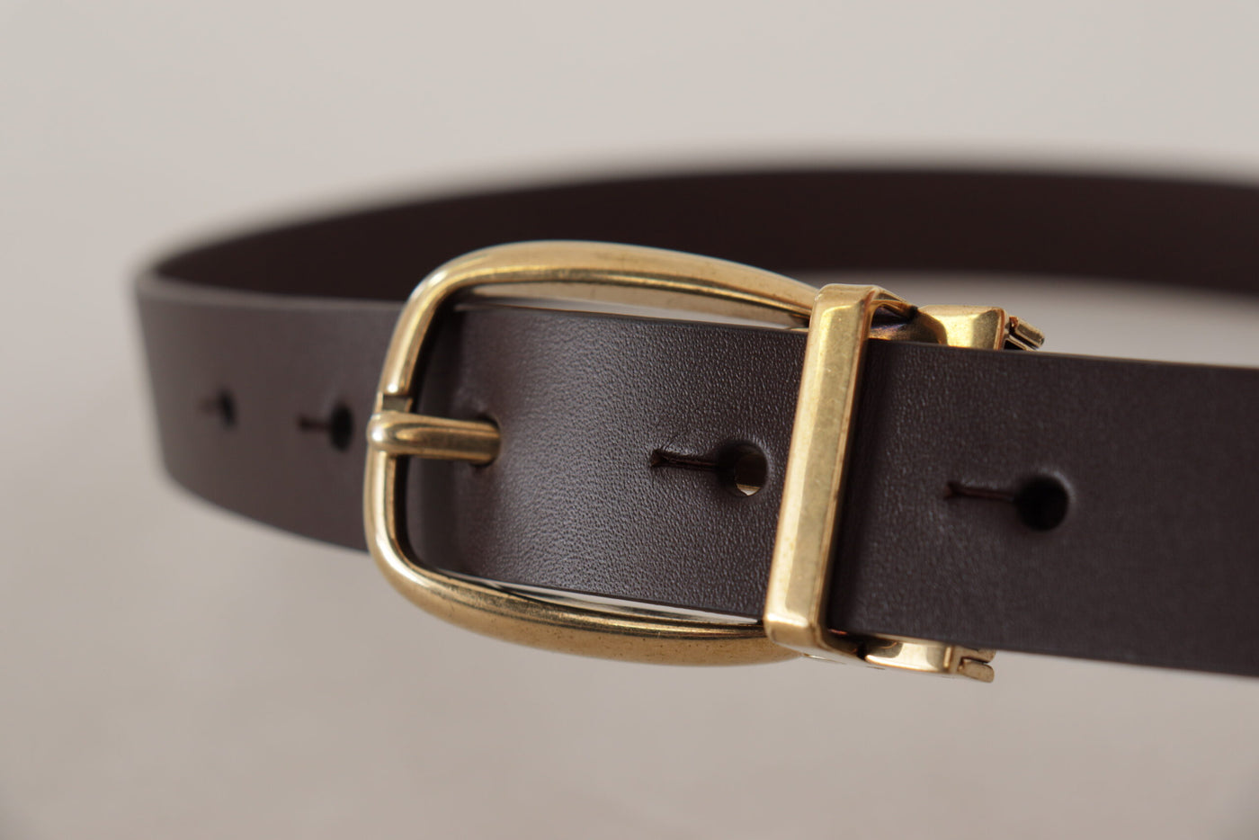 Dolce & Gabbana Dunkelbraunes Kalbsleder Goldfarbene Metallschnalle