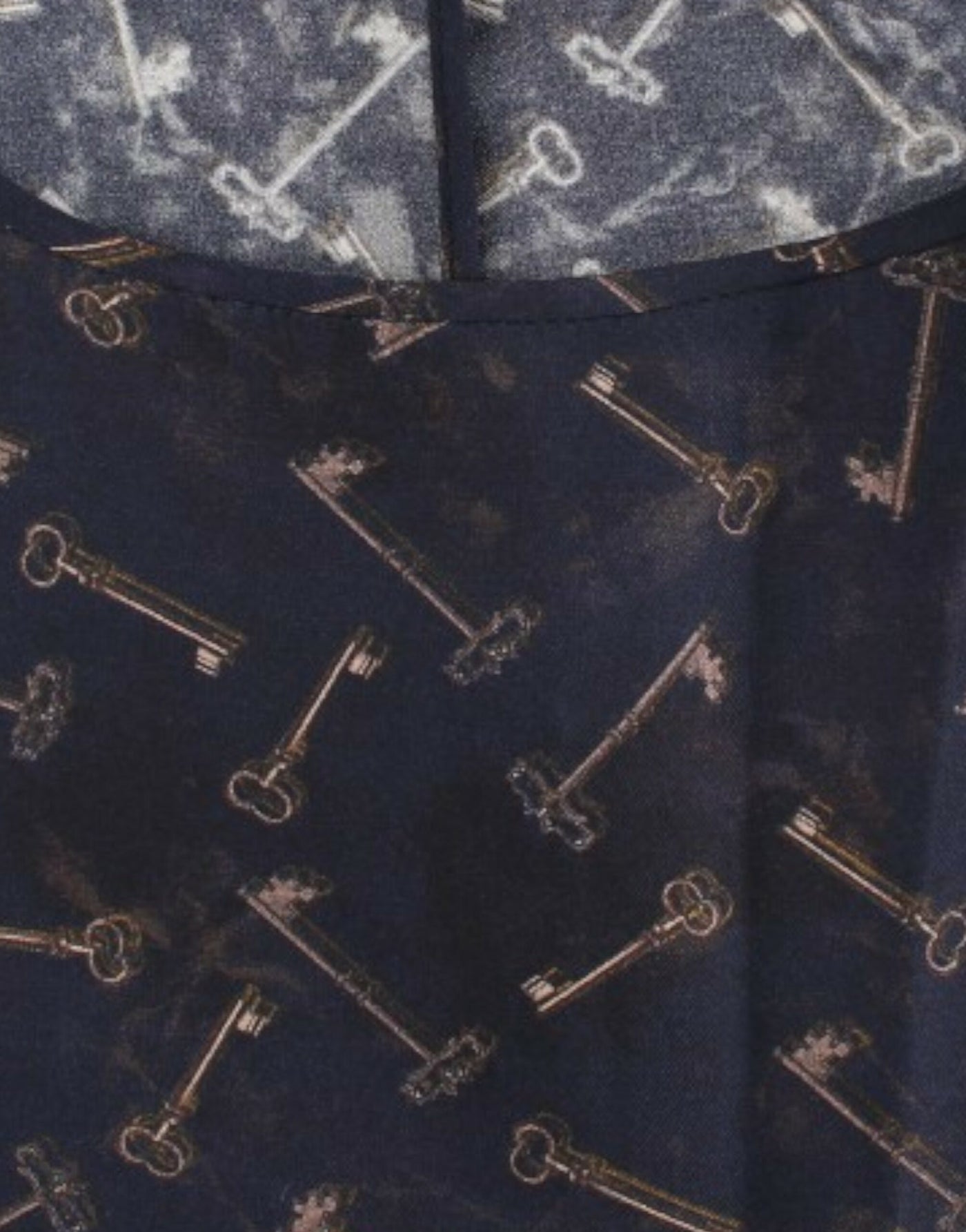 Dolce & Gabbana Blau-goldene Seidenbluse mit Schlüsseldruck