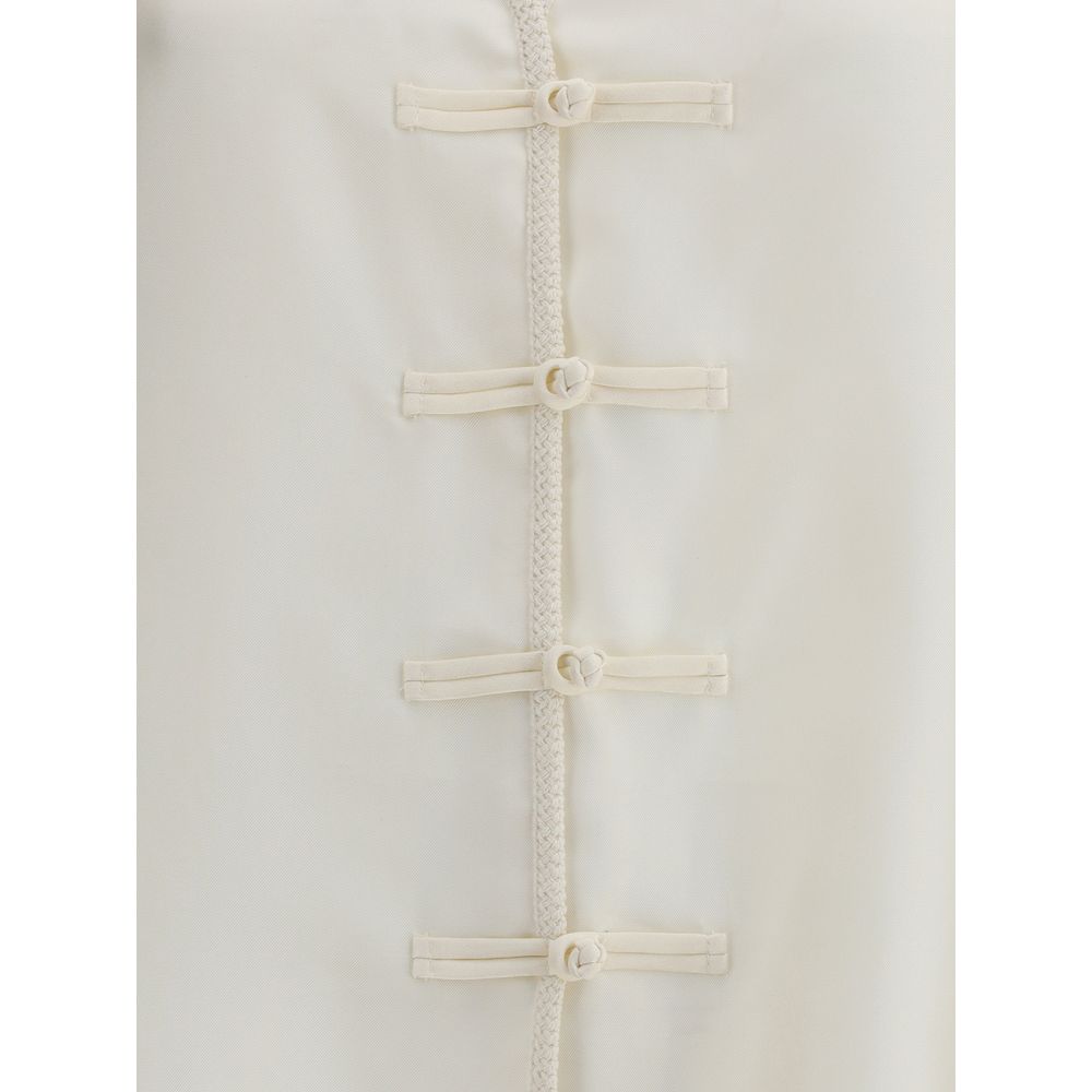 Courrèges Polo mit gedrehtem Detail