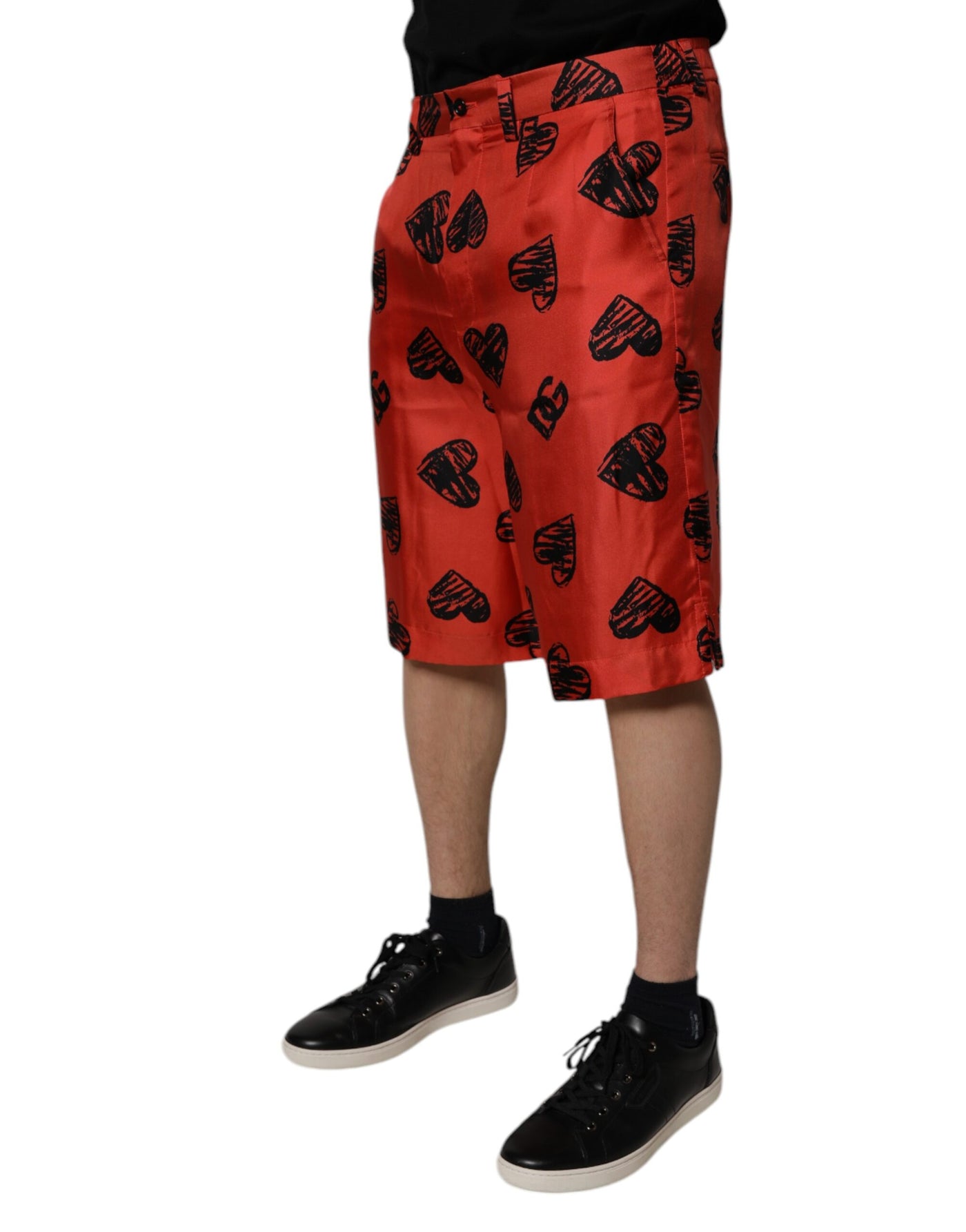 Dolce & Gabbana Orangefarbene Bermuda-Shorts mit Herz aus Seide
