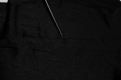 Dolce & Gabbana Schwarzes Strick-Top mit langen Ärmeln und schmalem Rollkragen