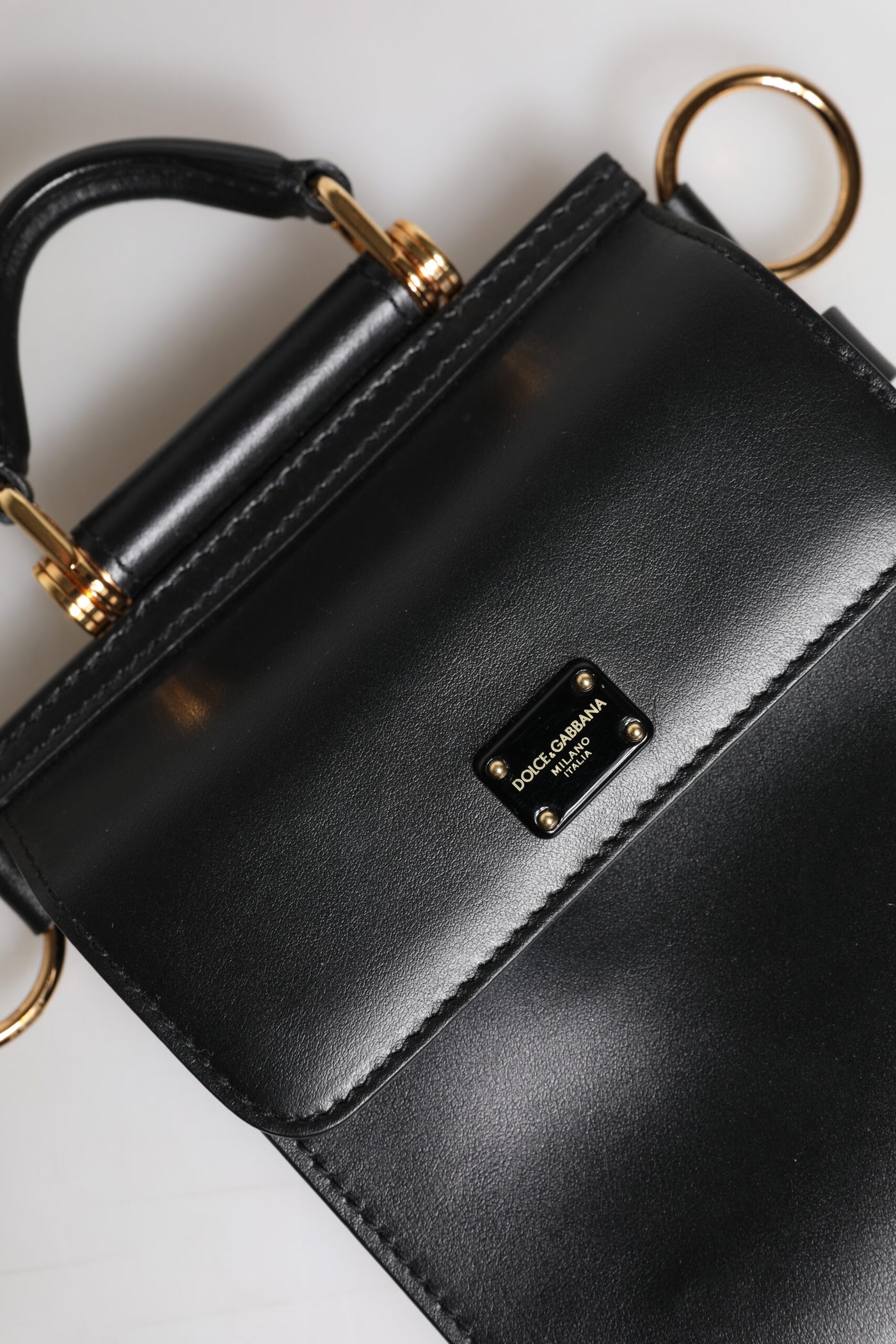 Dolce & Gabbana Schwarze Mini-Tasche aus Kalbsleder mit Logo-Plakette