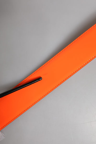 Dolce & Gabbana Orangefarbener goldfarbener Gürtel mit Logoschnalle aus Metall