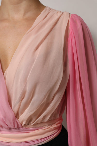 Dolce & Gabbana Pinkes Blusentop mit tiefem V-Ausschnitt und langen Ärmeln