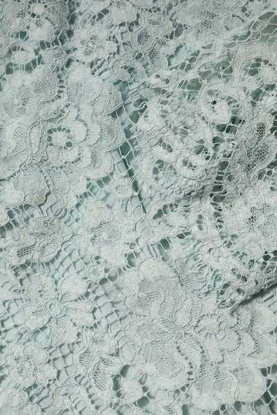 Dolce & Gabbana Mintgrünes Blusenoberteil aus Baumwolle mit Blumenmuster