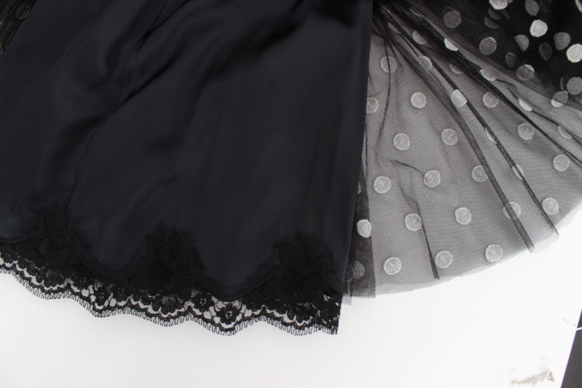 Dolce & Gabbana Schwarz-weiß gepunktetes Kleid mit Rüschen