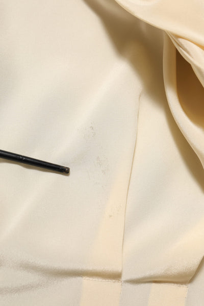 Dolce & Gabbana Hellgelbes Blusenoberteil mit Ascot-Kragen und Knopfleiste
