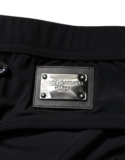 Dolce & Gabbana Schwarze Logoplakette Männer Beachwear Brief Bademode