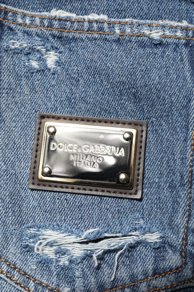 Dolce & Gabbana Blaue zerfledderte Baumwoll-Logo-Plakette Denim-Jeans
