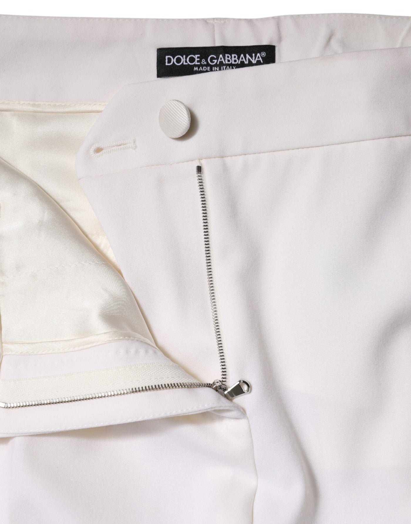 Dolce & Gabbana Weiße konisch zulaufende Hose aus Wolle mit mittlerer Taille