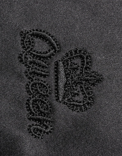 Dolce & Gabbana Schwarzes Seidenblusentop mit Ascot-Kragen und Knöpfen