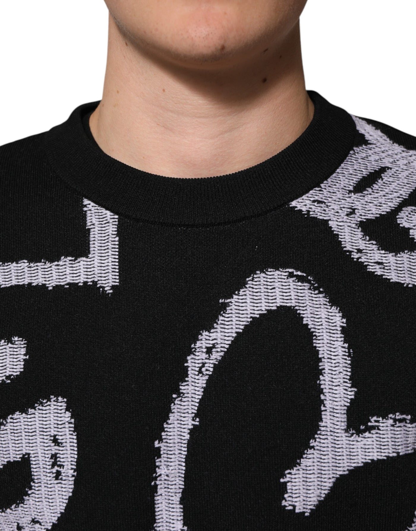Dolce & Gabbana Schwarzer Pullover aus Nylonwolle mit Herzmotiv
