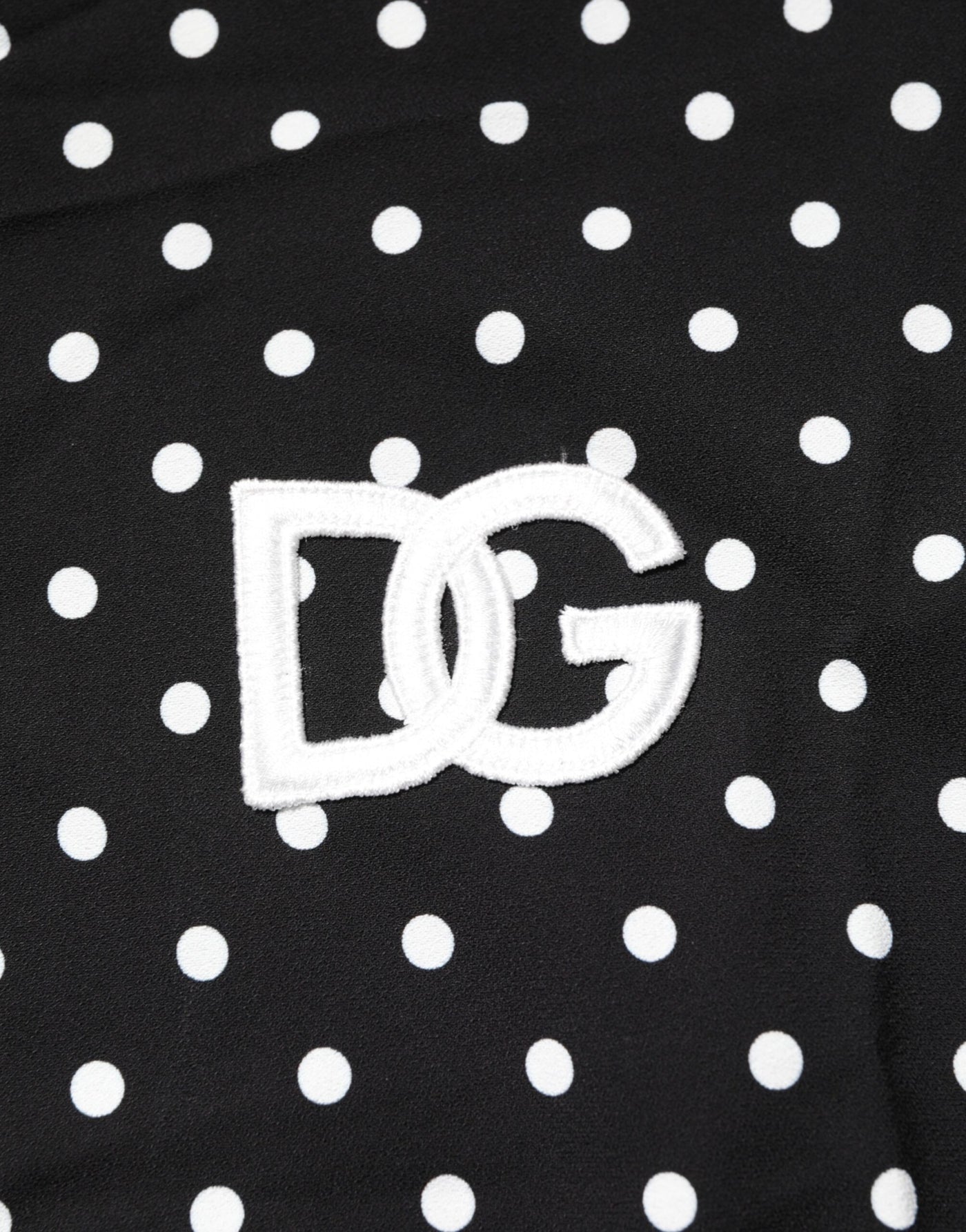 Dolce & Gabbana Schwarzes gepunktetes Polo-T-Shirt mit kurzen Ärmeln und Kragen